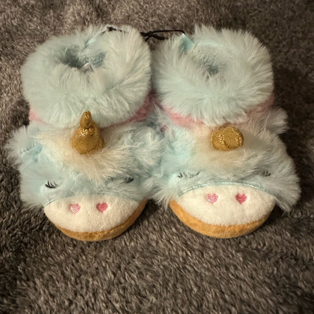 Brand new never worn baby unicorn slippers